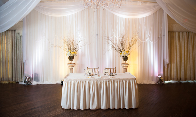 Custom draping in white chiffon by W Drapings for a wedding reception at Highland Manor Apopka. Photo by Laura Yang Photography.